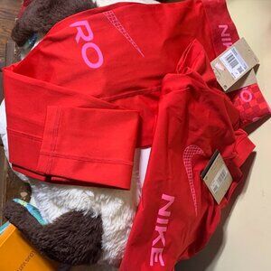 Red  Nike crop top and leggings